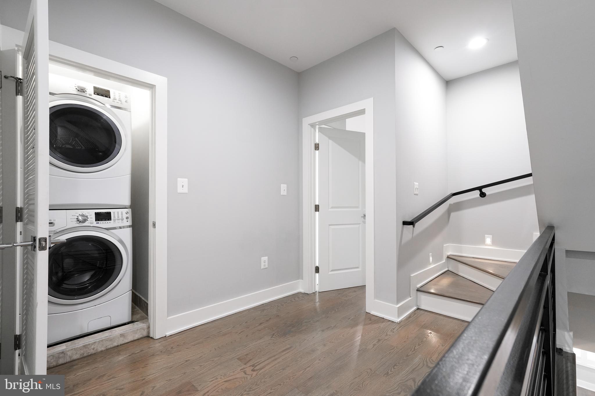 1632 K Street Northeast, Unit PH Washington, DC 20002 - Photo 60 of 69 a view of a hallway with washer and dryer