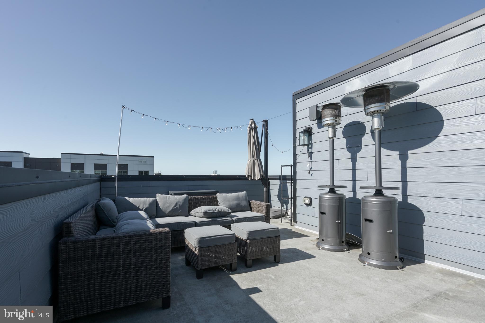 1632 K Street Northeast, Unit PH Washington, DC 20002 - Photo 66 of 69 a living room with furniture