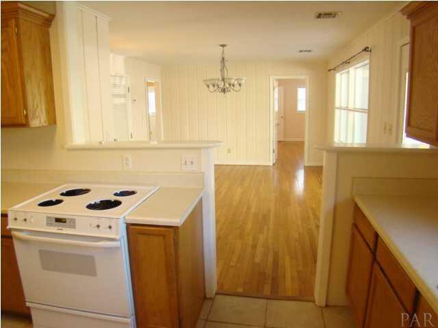 4810 Creighton Road Pensacola, FL 32504 - Photo 4 of 22 Dining room with kitchen