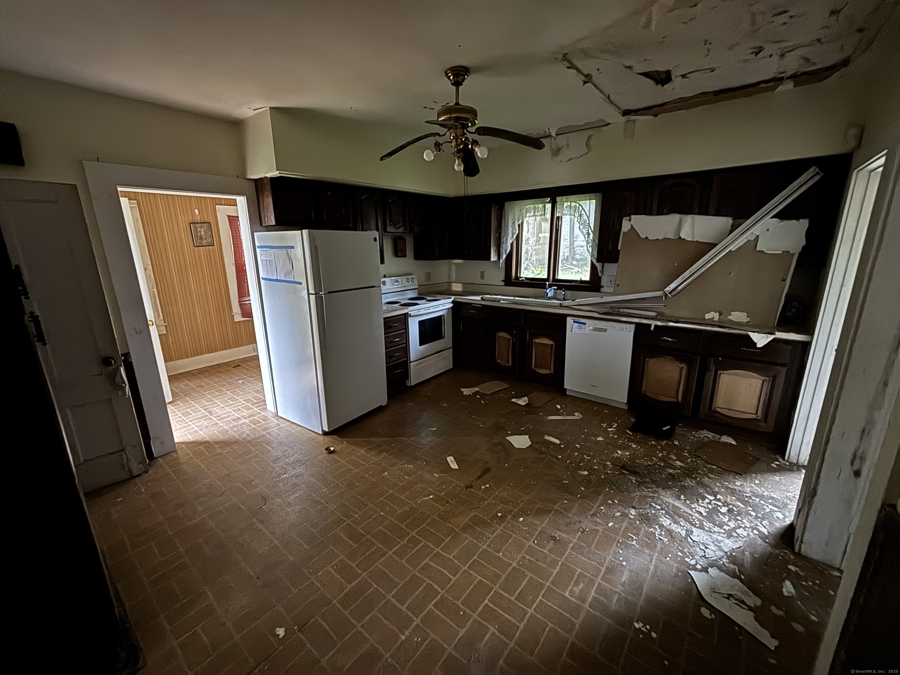 25 Clinton Avenue Middletown, CT 06457 - Photo 12 of 31 a view of a kitchen with refrigerator and microwave