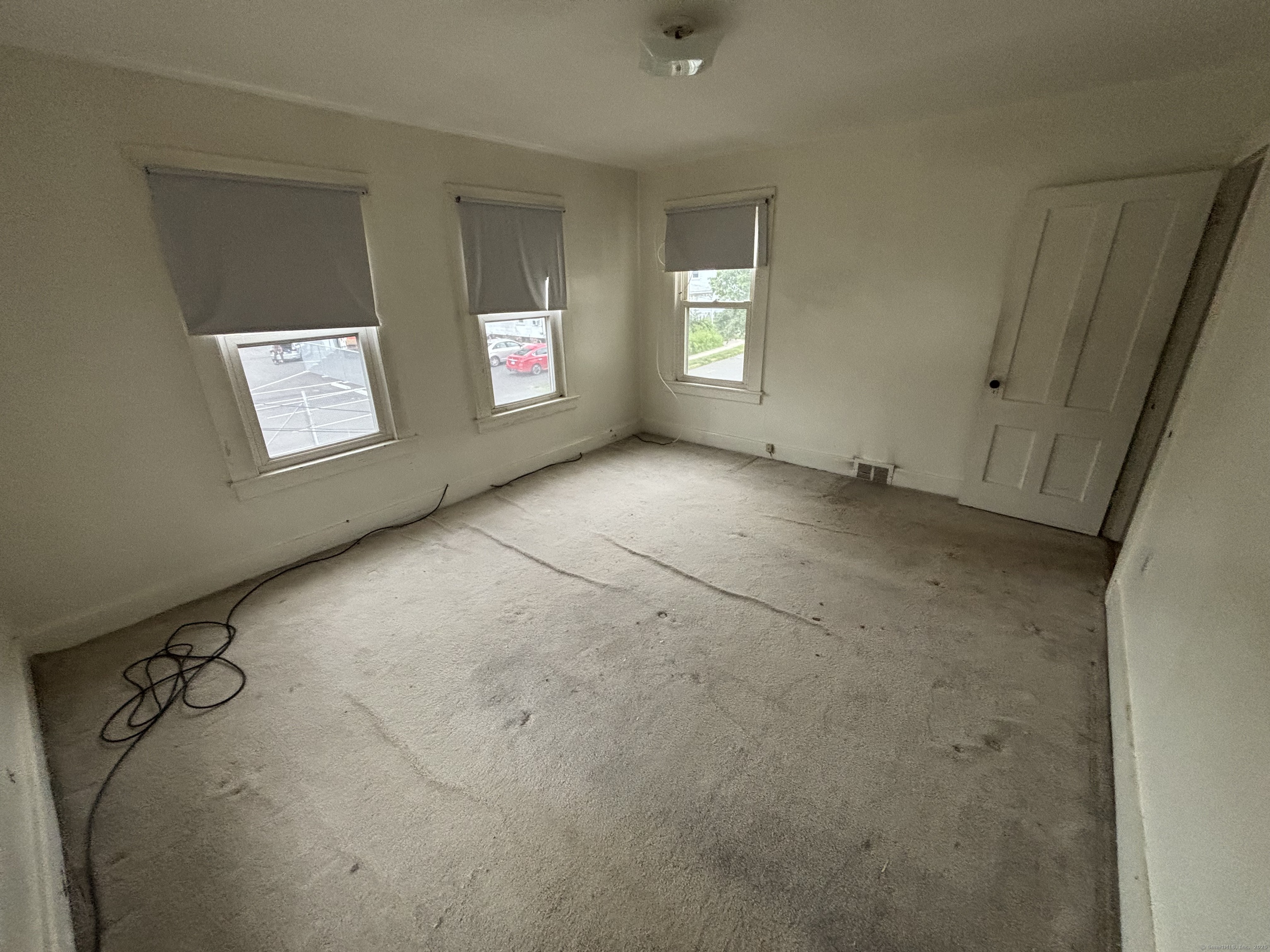 25 Clinton Avenue Middletown, CT 06457 - Photo 22 of 31 a view of an empty room with a window