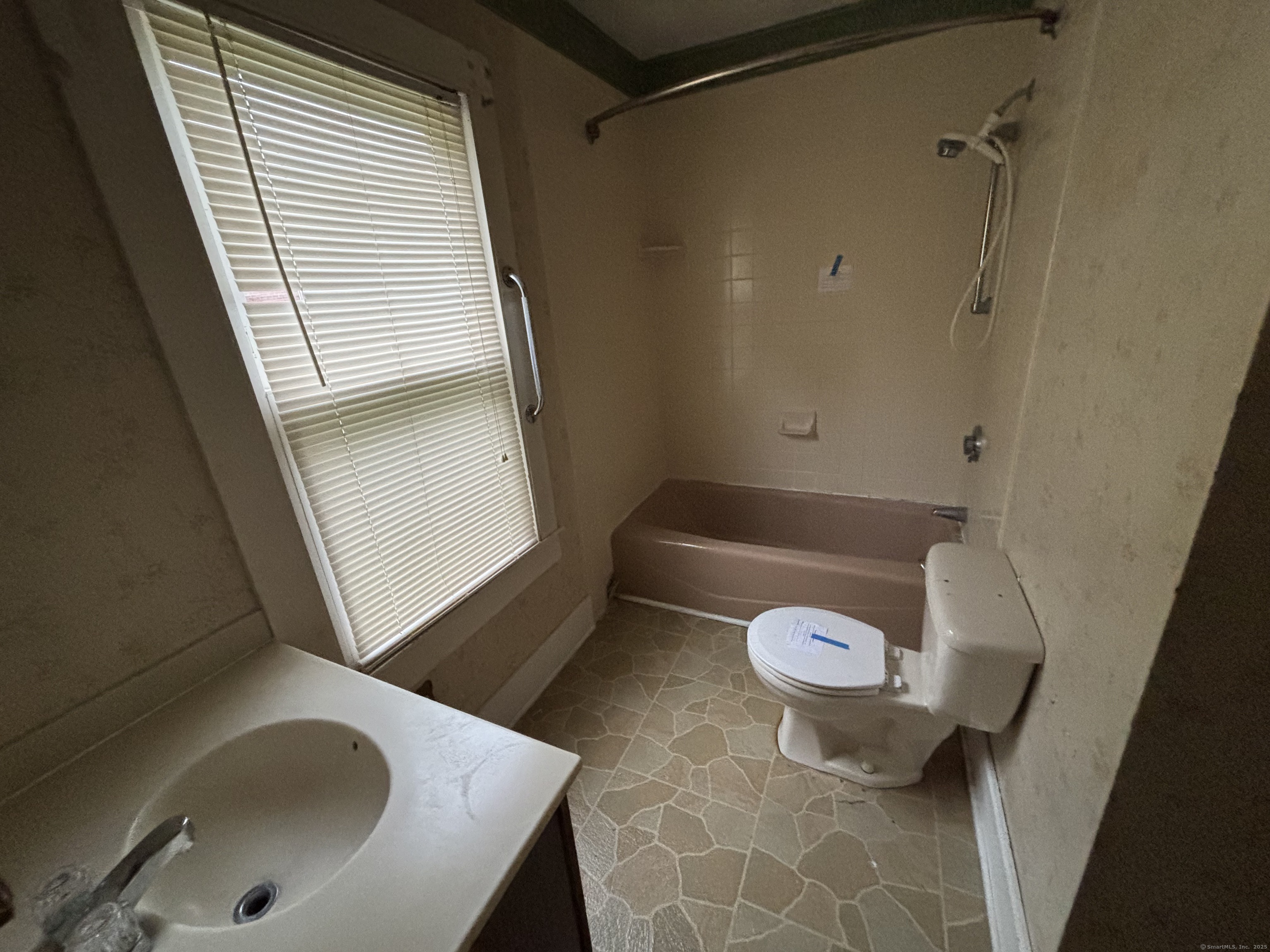 25 Clinton Avenue Middletown, CT 06457 - Photo 25 of 31 a bathroom with a sink and a toilet