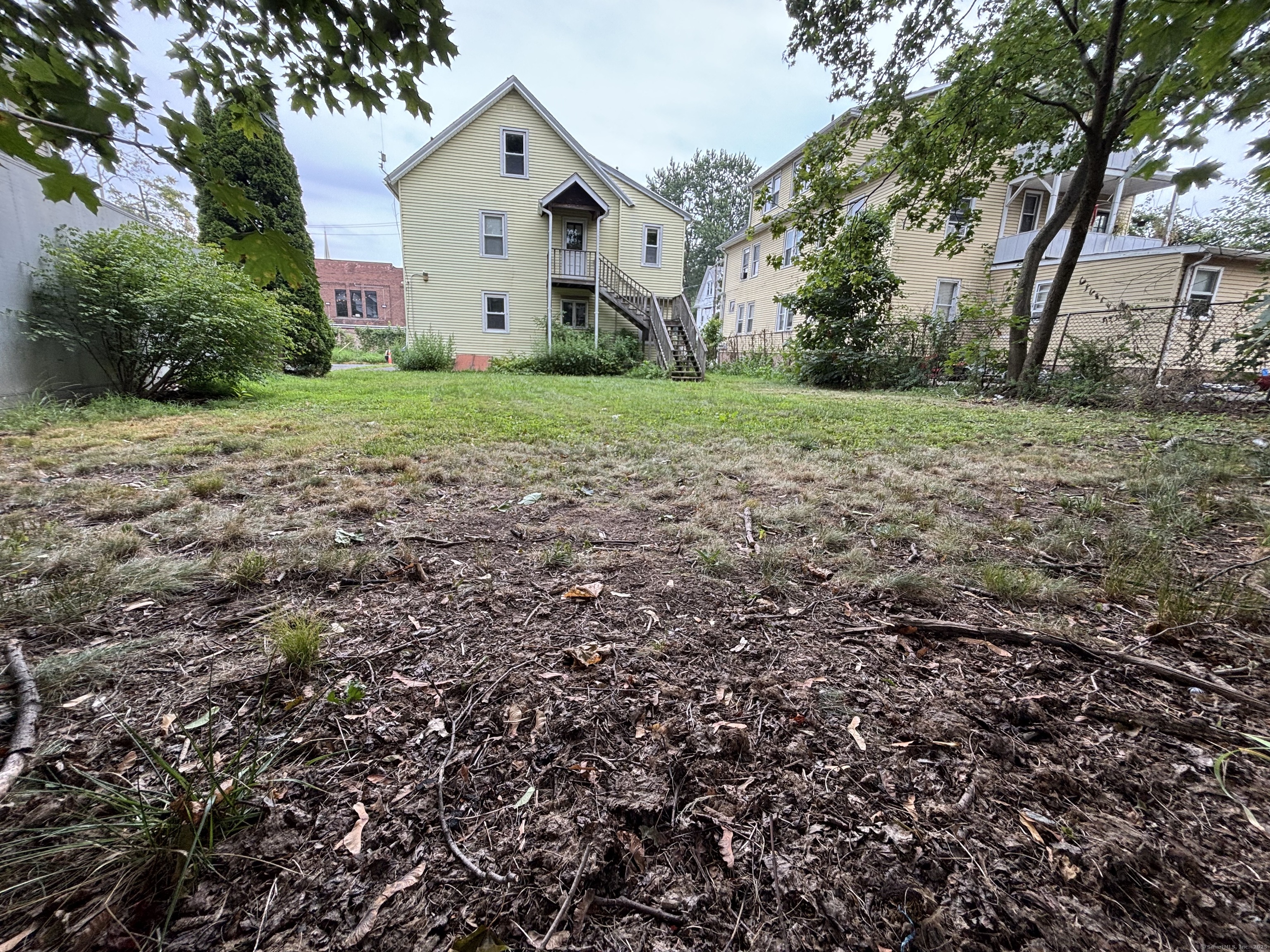 25 Clinton Avenue Middletown, CT 06457 - Photo 7 of 31 a view of a house with a yard