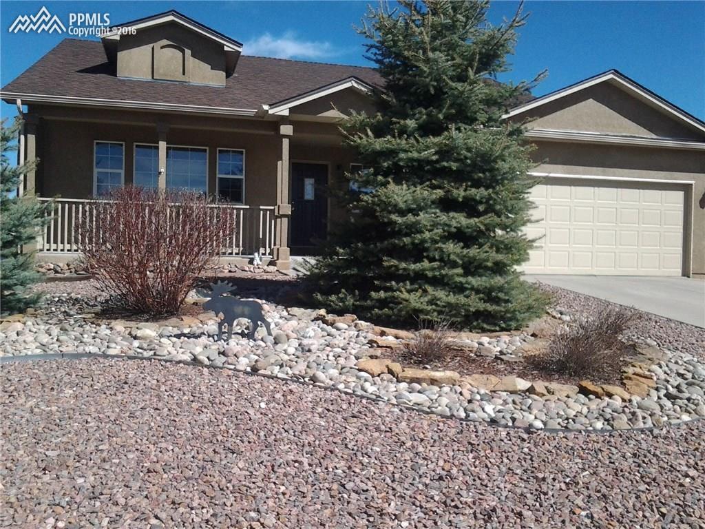 12306 Snaffle Bit Road Peyton, CO 80831 - Photo 1 of 13