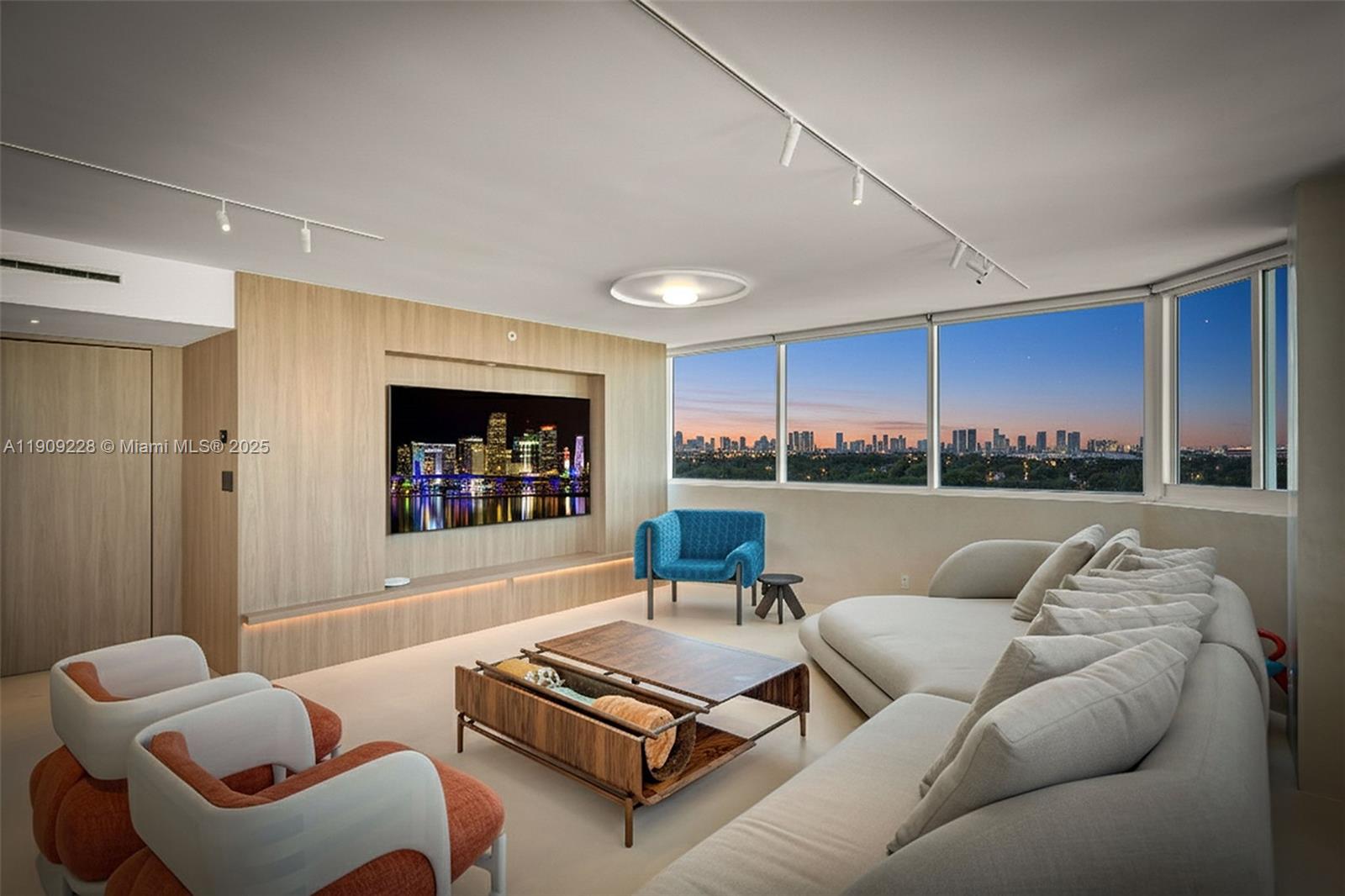 3411 Indian Creek Drive, Unit 1201 Miami Beach, FL 33140 - Photo 14 of 68 a living room with furniture and a large window