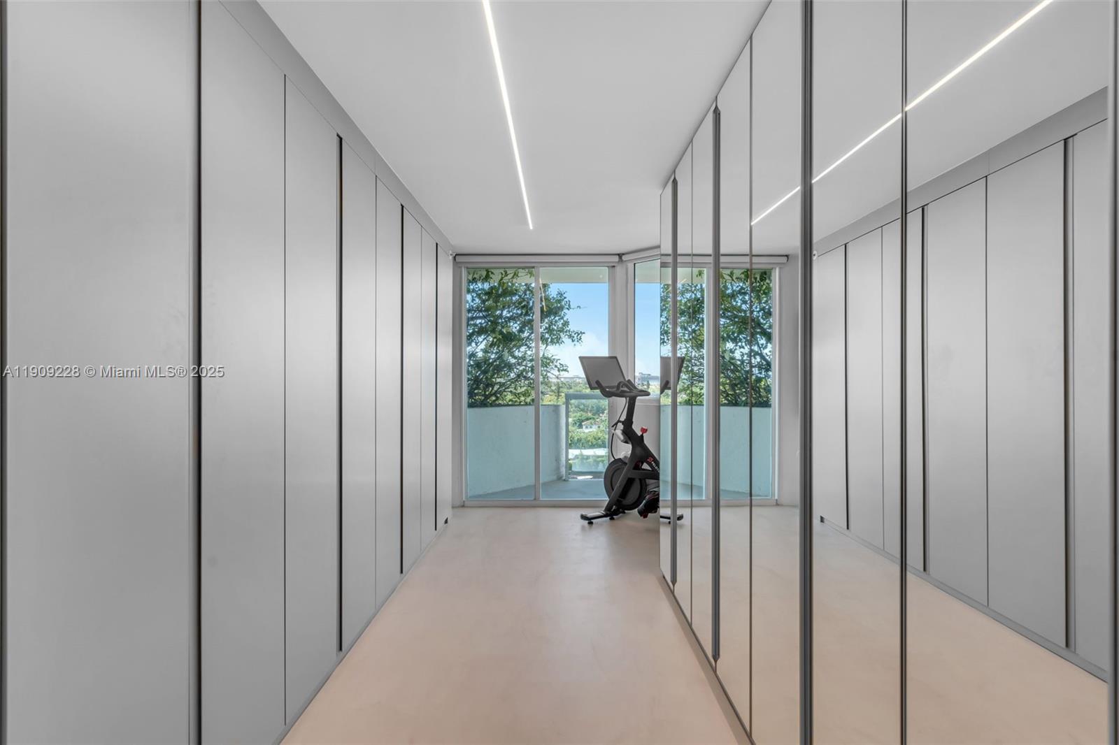 3411 Indian Creek Drive, Unit 1201 Miami Beach, FL 33140 - Photo 30 of 68 a view of hallway with furniture and floor to ceiling window