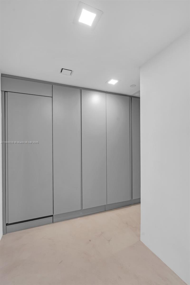 3411 Indian Creek Drive, Unit 1201 Miami Beach, FL 33140 - Photo 41 of 68 an empty room with an entryway