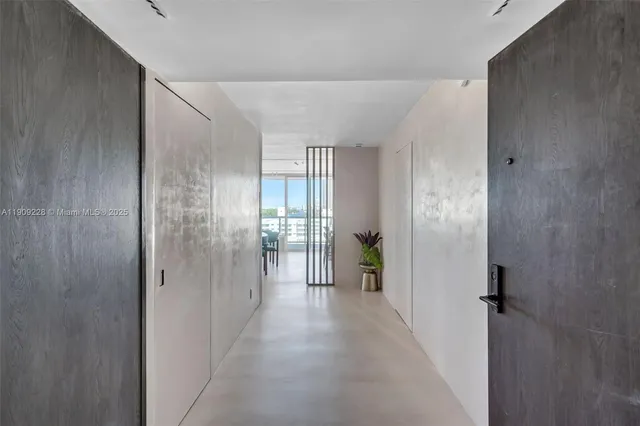 a view of roof deck with dining table and chair