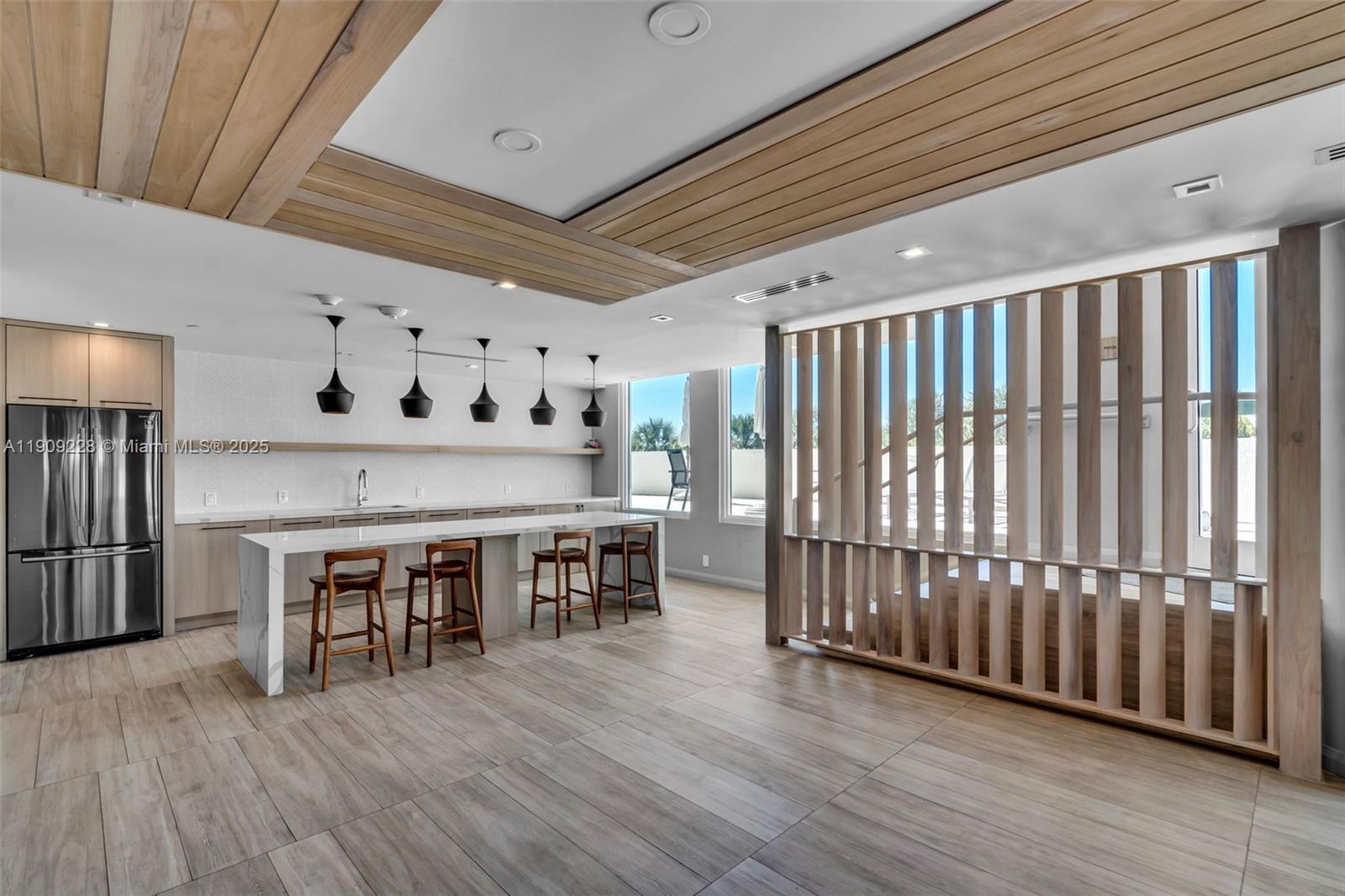 3411 Indian Creek Drive, Unit 1201 Miami Beach, FL 33140 - Photo 49 of 68 a view of a room with furniture and wooden floor