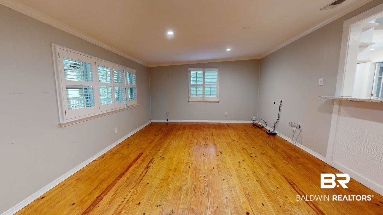 48 Hathaway Road West Mobile, AL 36608 - Photo 13 of 40 Unfurnished room featuring light wood-type flooring and ornamental molding