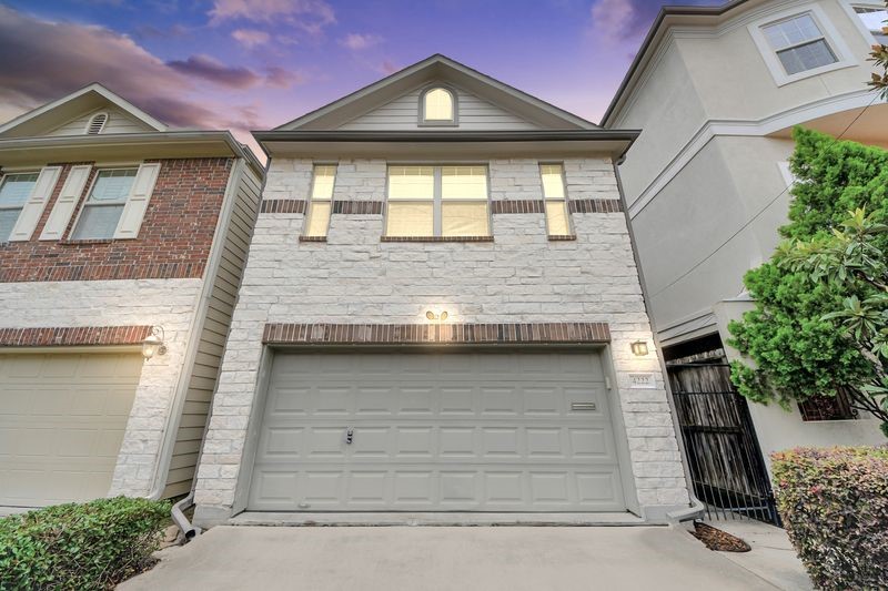 4222 Drake Street Houston, TX 77005 - Photo 3 of 28 a front view of a house with a garage