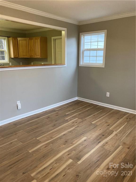 1560 Legion Road Fort Mill, SC 29715 - Photo 2 of 8 a view of a room with wooden floor and a window