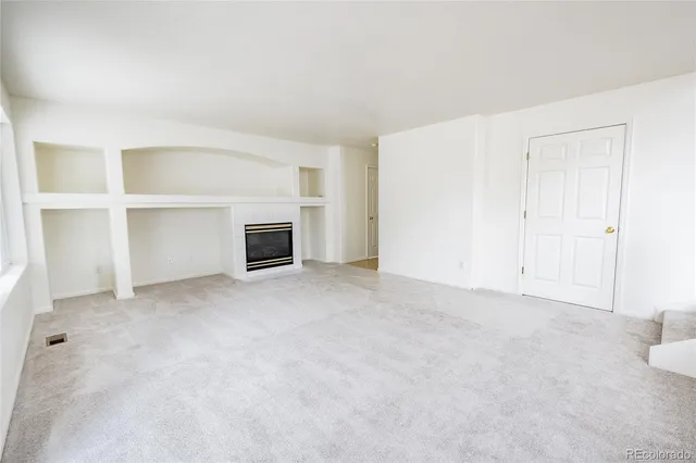 a spacious bathroom with a tub shower and sink