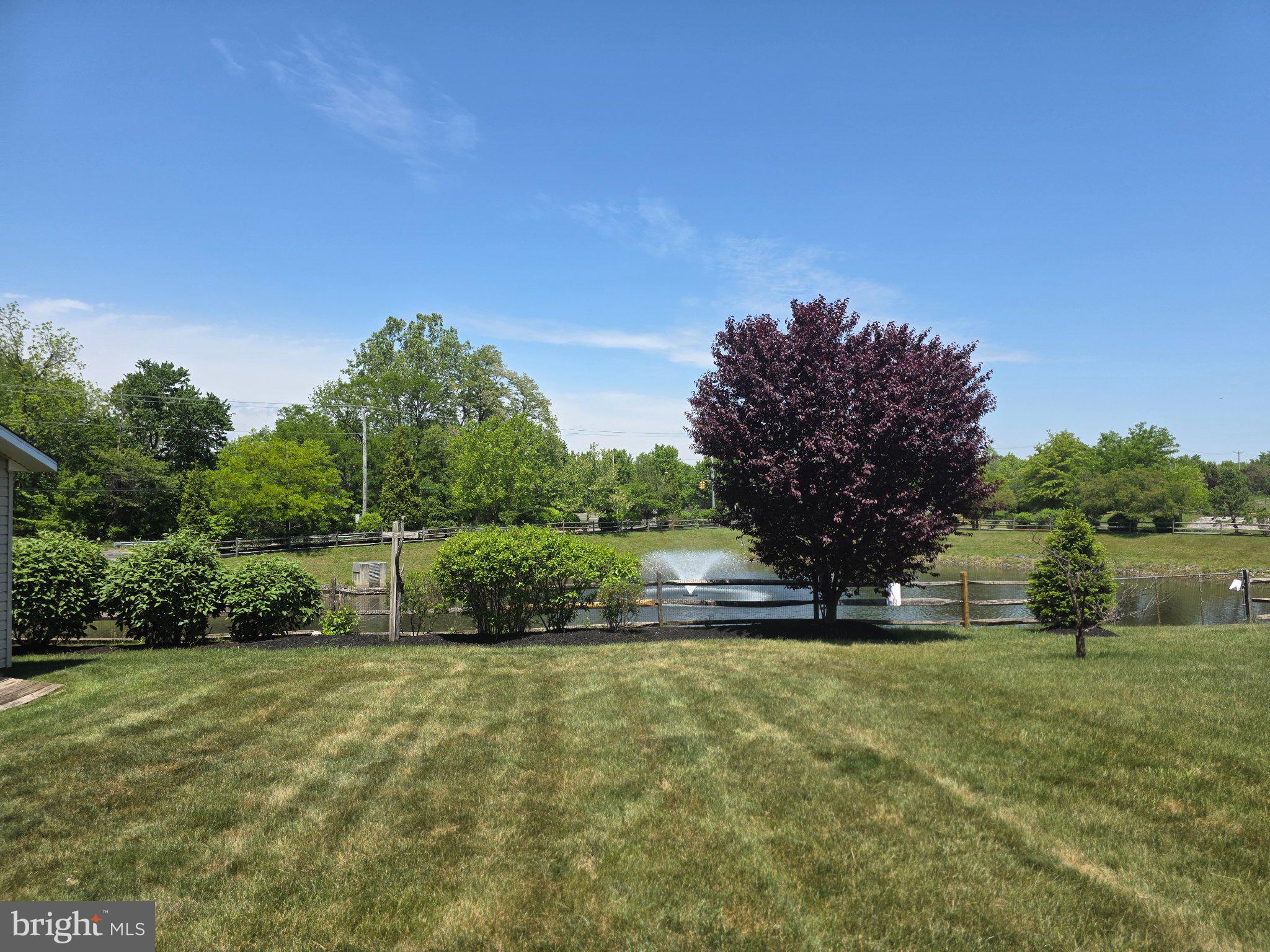 53 Buckeye Road Swedesboro, NJ 08085 - Photo 3 of 47 Tranquil pondside retreat with lush greenery.