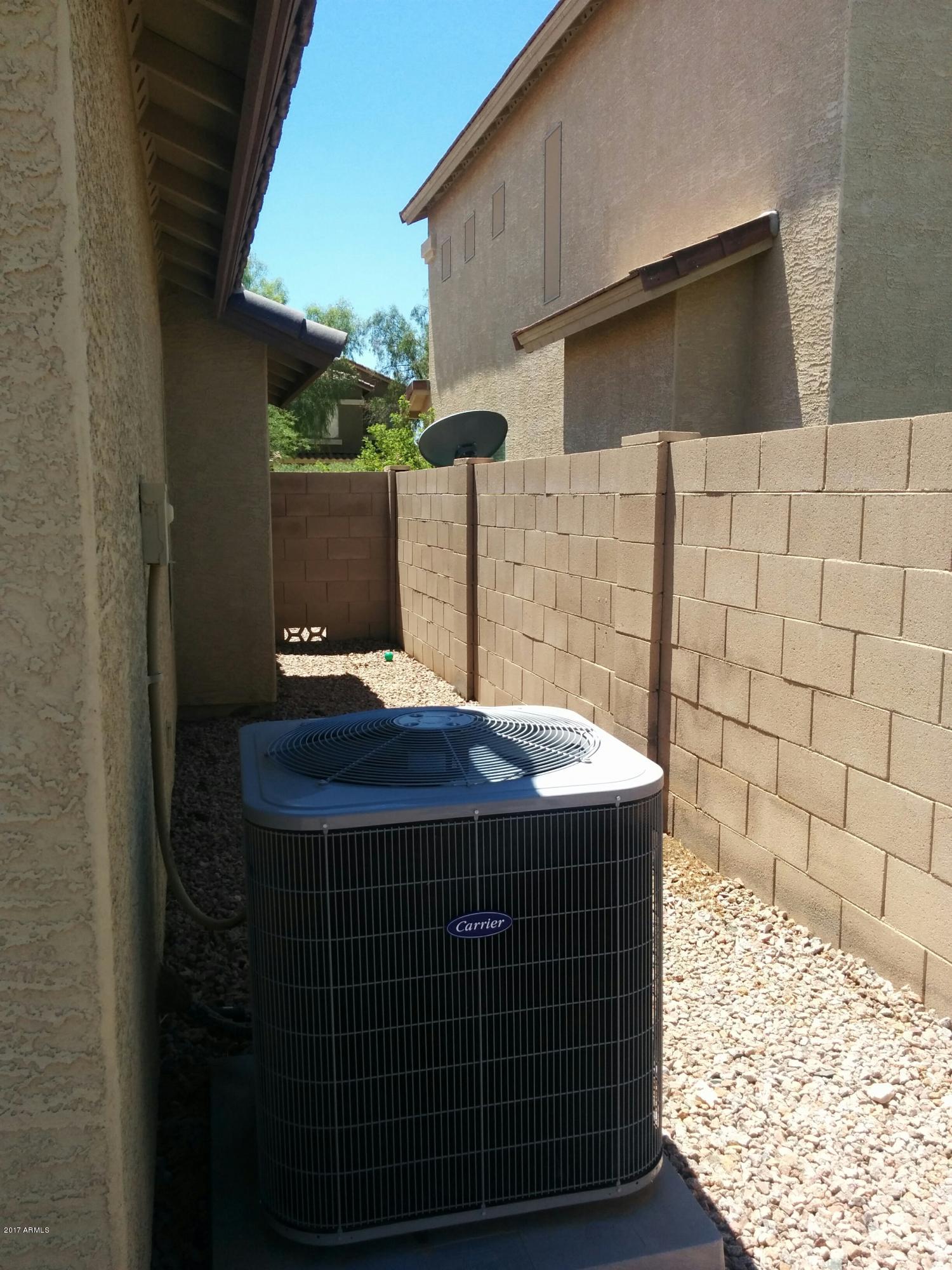 45060 Portabello Road Maricopa, AZ 85139 - Photo 23 of 29 West Side of the House
