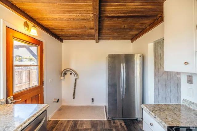 an aerial view of a house with yard swimming pool and outdoor seating