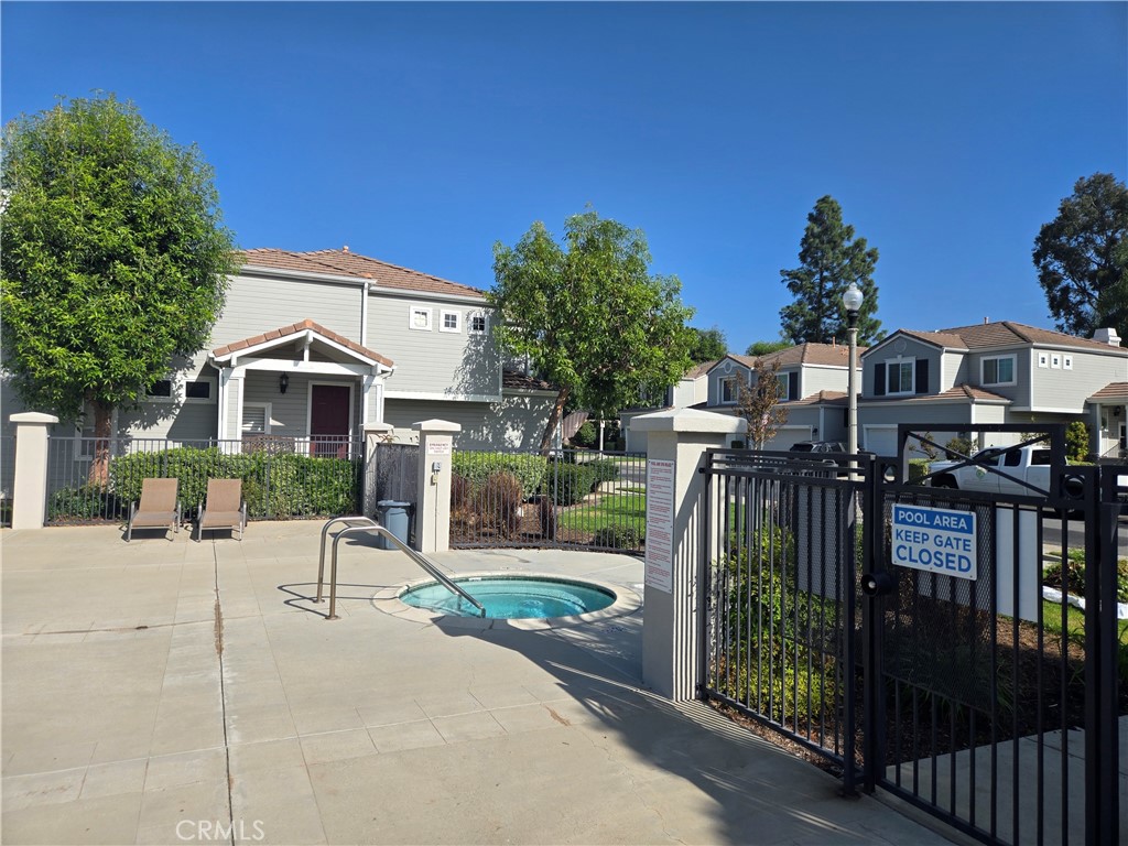 333 Pony Expressway San Dimas, CA 91773 - Photo 3 of 12 a view of a house with a yard