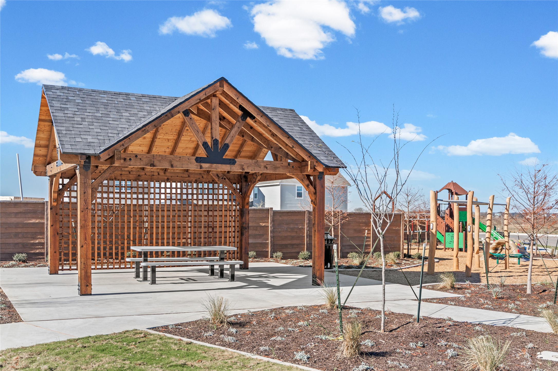 317 Carmel Cyn Trail Jarrell, TX 76537 - Photo 6 of 8 View of playground featuring a patio