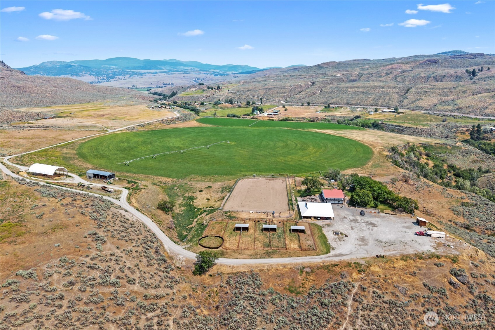 a view of a ocean beach and mountain