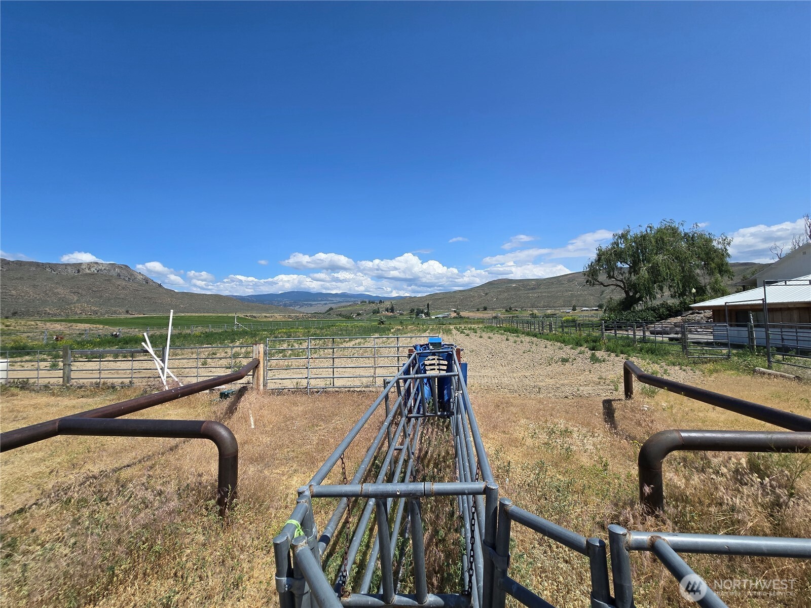 93 Warren Road Tonasket, WA 98855 - Photo 21 of 31 a view of a lake with a terrace