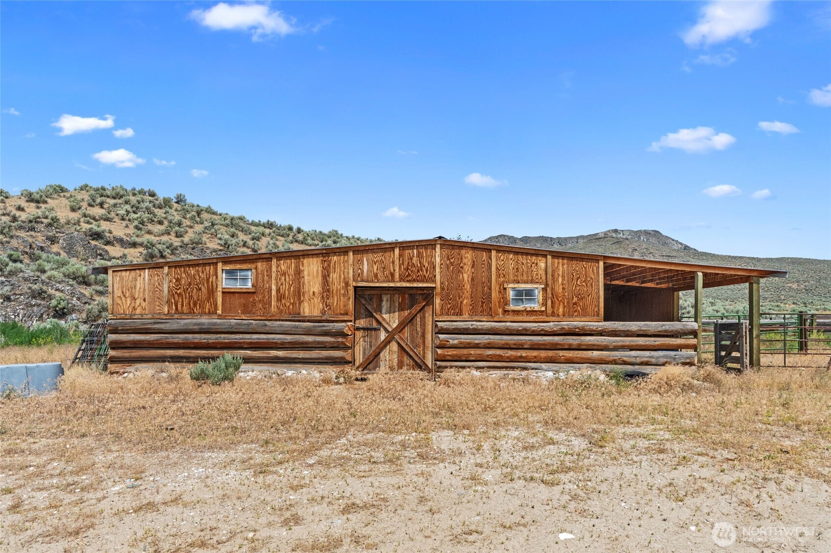 93 Warren Road Tonasket, WA 98855 - Photo 29 of 31 a front view of a house with a yard