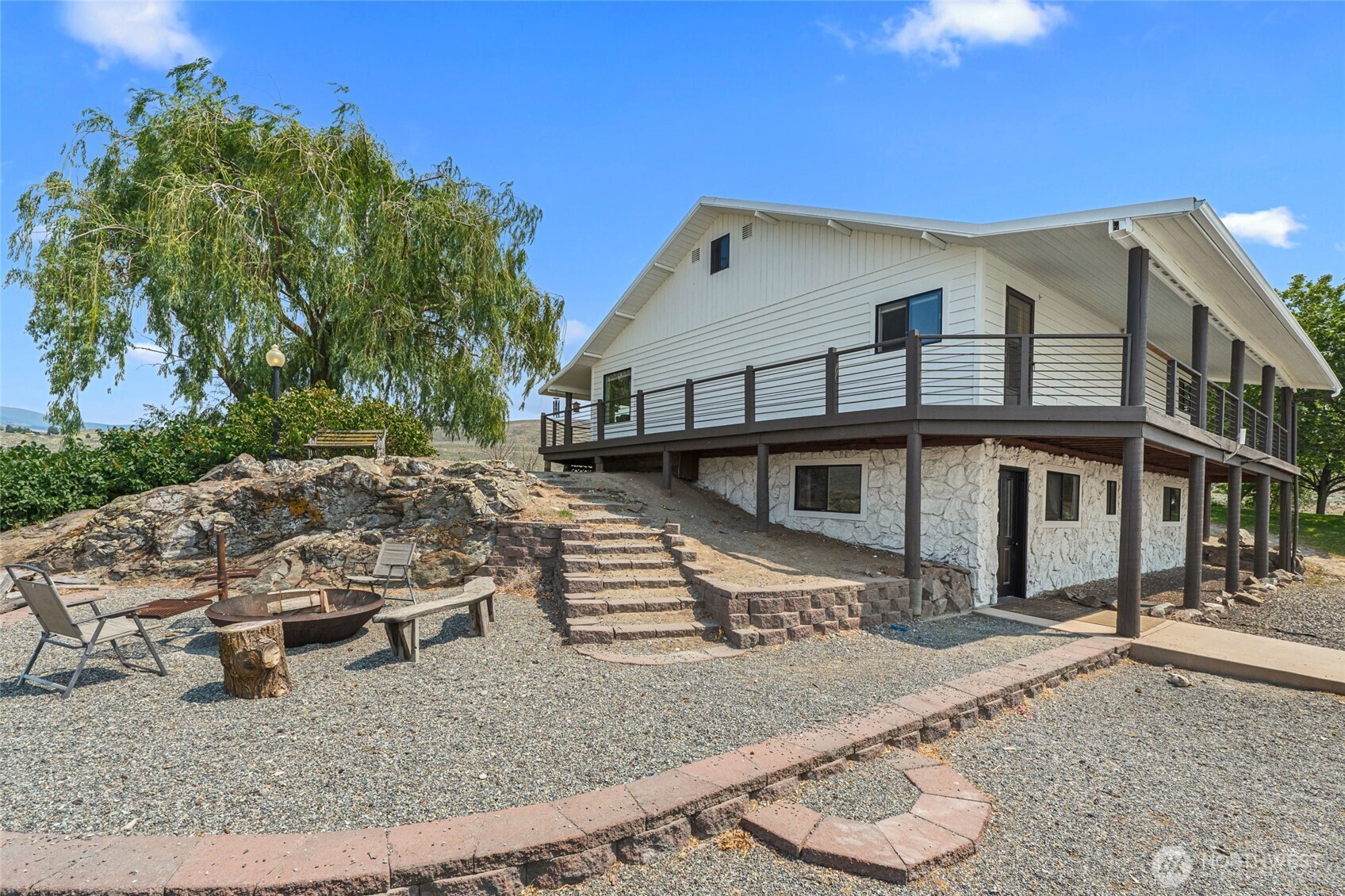 93 Warren Road Tonasket, WA 98855 - Photo 5 of 31 a view of a house with entertaining space