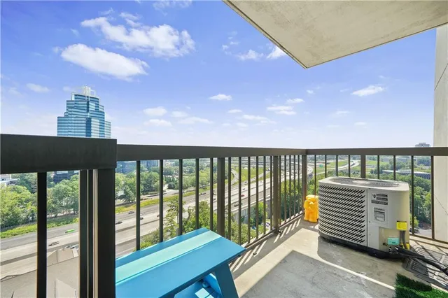 a view of a balcony with an outdoor space