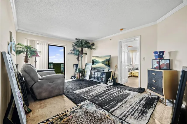 a living room with furniture rug and lamp