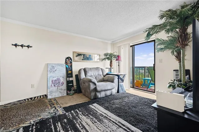 a bedroom with furniture and a fireplace