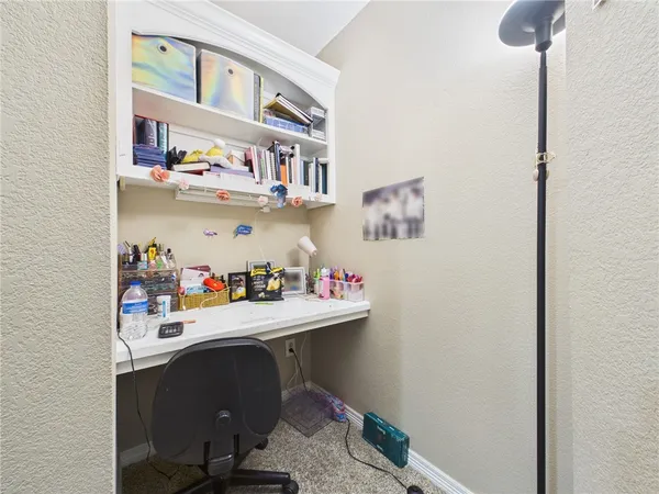a white toilet sitting next to a shower curtain