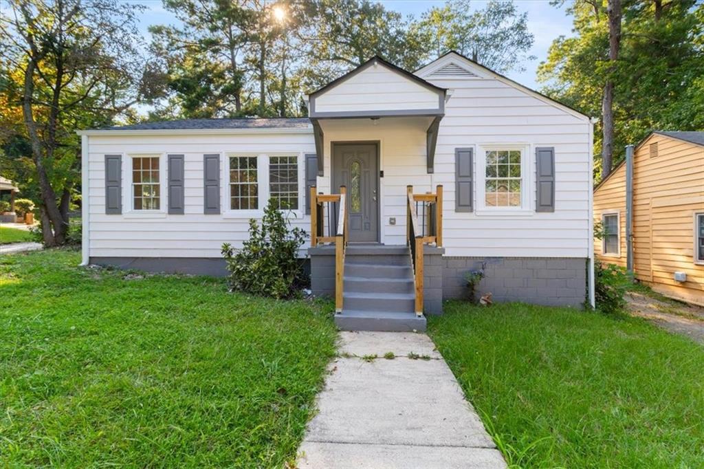 front view of house with a yard