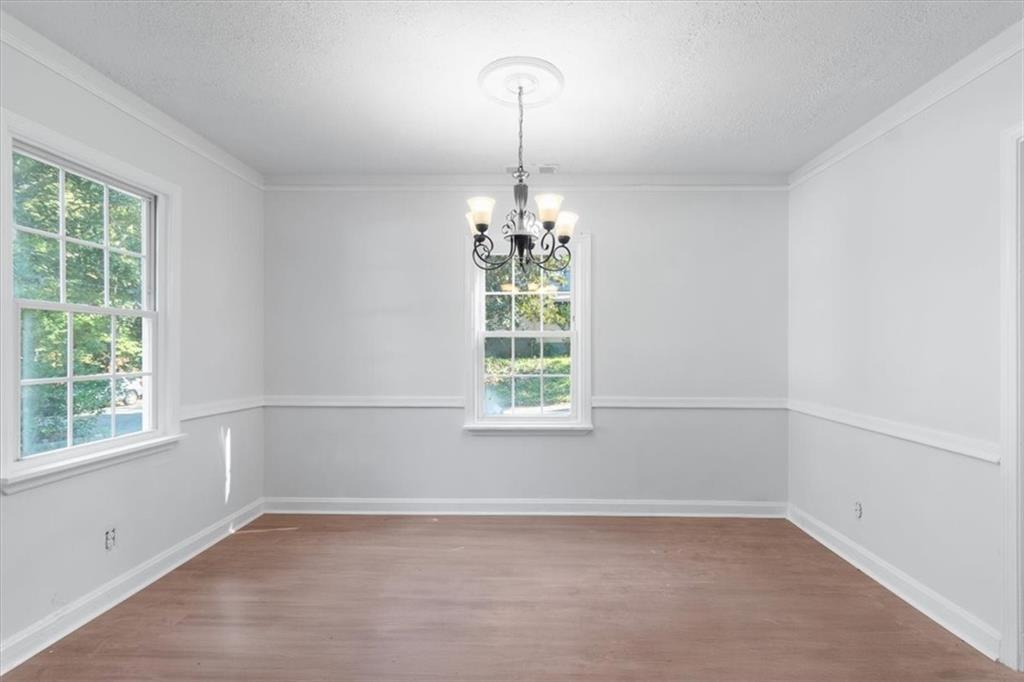 1347 Westmont Road Southwest Atlanta, GA 30311 - Photo 11 of 26 an empty room with a window