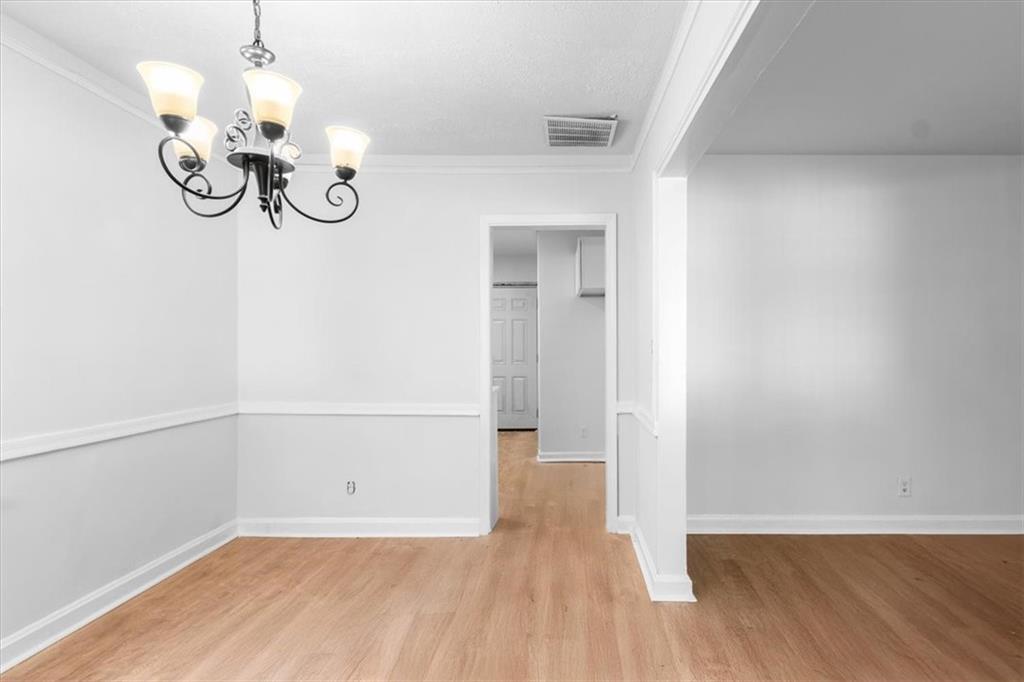 1347 Westmont Road Southwest Atlanta, GA 30311 - Photo 12 of 26 a view of a hallway with wooden floor