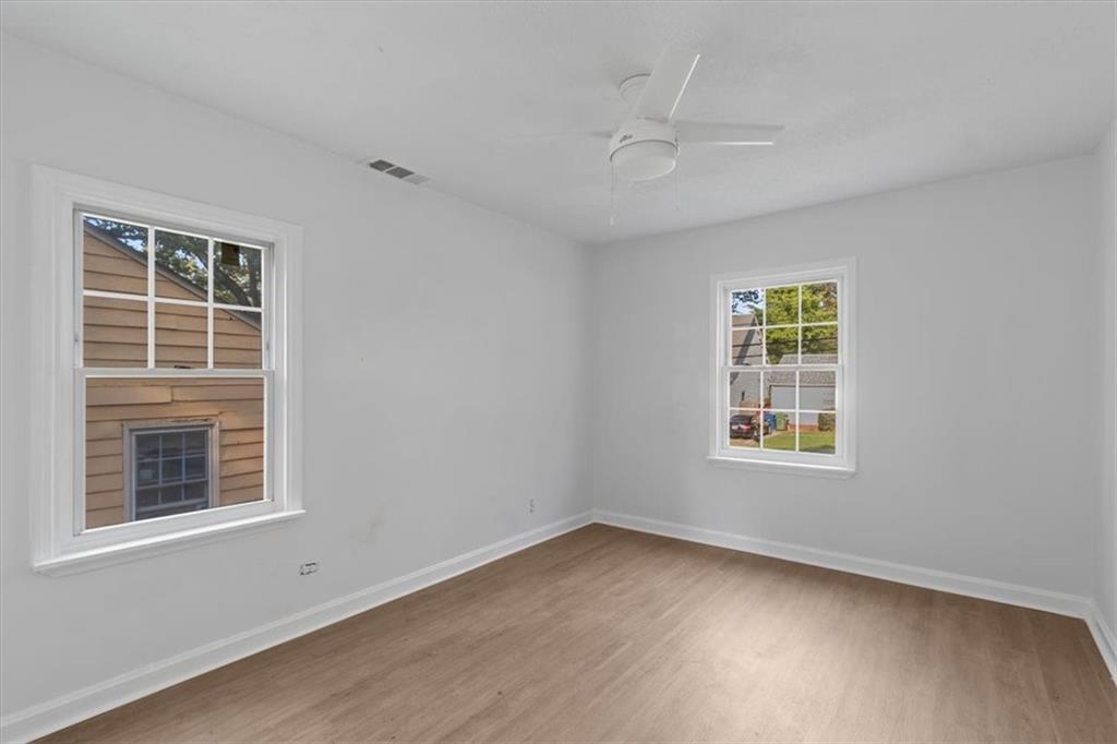 1347 Westmont Road Southwest Atlanta, GA 30311 - Photo 18 of 26 an empty room with a window