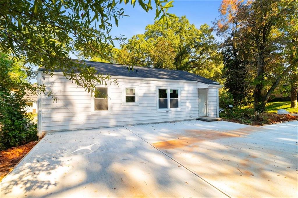 1347 Westmont Road Southwest Atlanta, GA 30311 - Photo 24 of 26 a view of a house with a yard