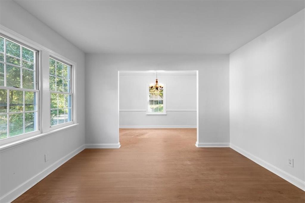 1347 Westmont Road Southwest Atlanta, GA 30311 - Photo 3 of 26 an empty room with windows