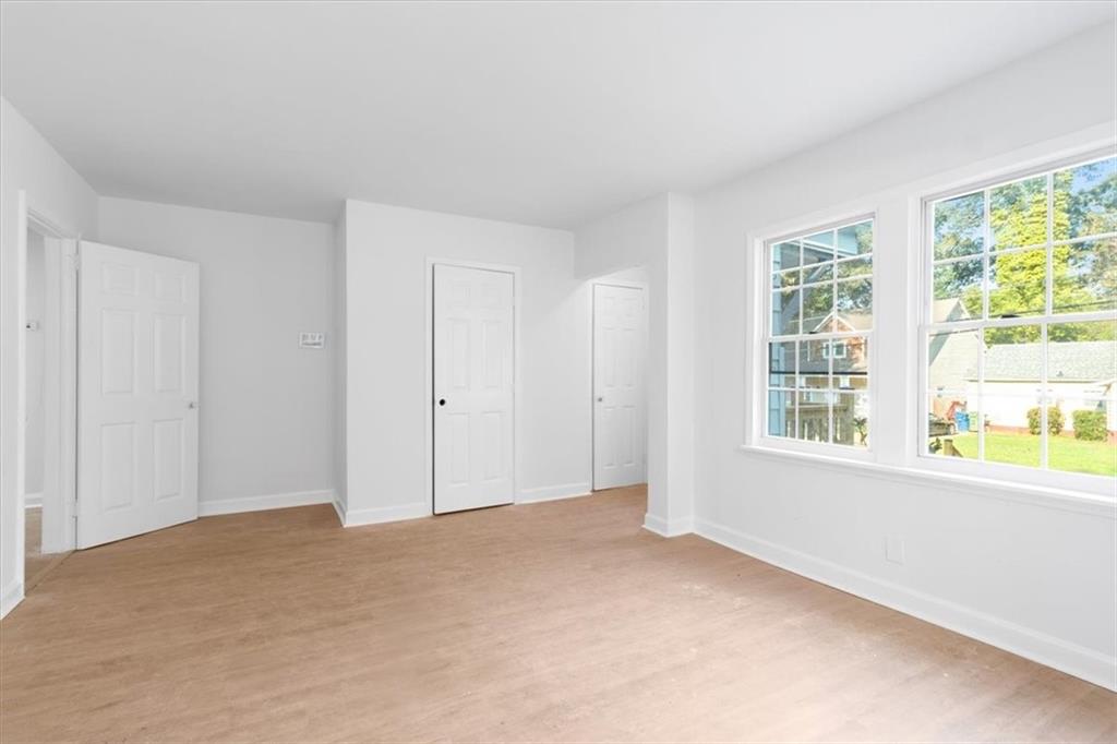 1347 Westmont Road Southwest Atlanta, GA 30311 - Photo 10 of 26 a view of an empty room with a window