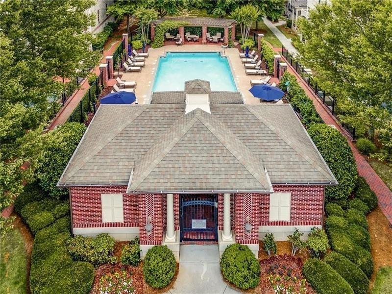 3655 East Paces Walk Atlanta, GA 30326 - Photo 24 of 31 a front view of a house with garden