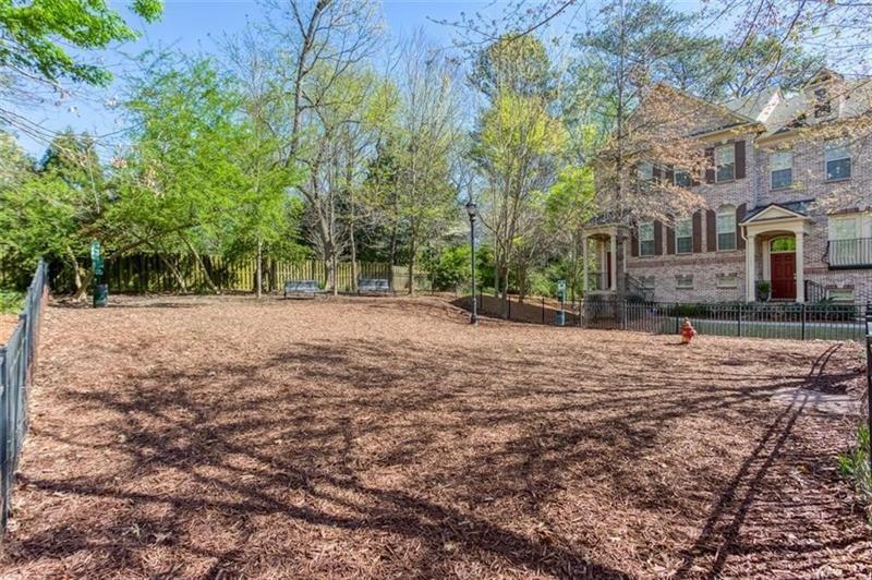 3655 East Paces Walk Atlanta, GA 30326 - Photo 28 of 31 a view of road with large trees