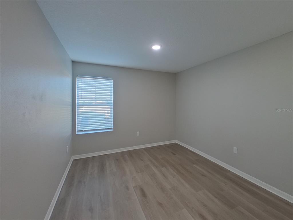 Undisclosed Address Apollo Beach, FL 33572 - Photo 11 of 20 an empty room with a window