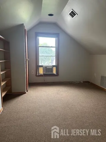 a view of deck with wooden floor and fence