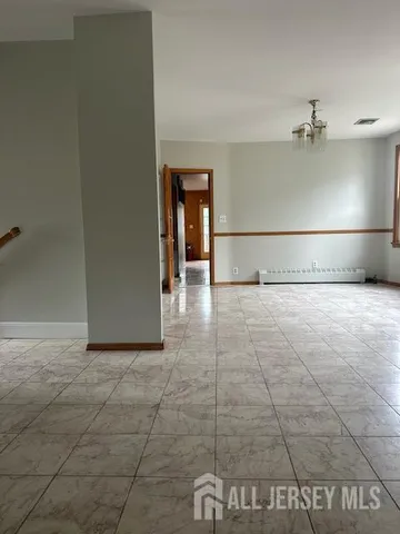a kitchen with a sink a stove and cabinets