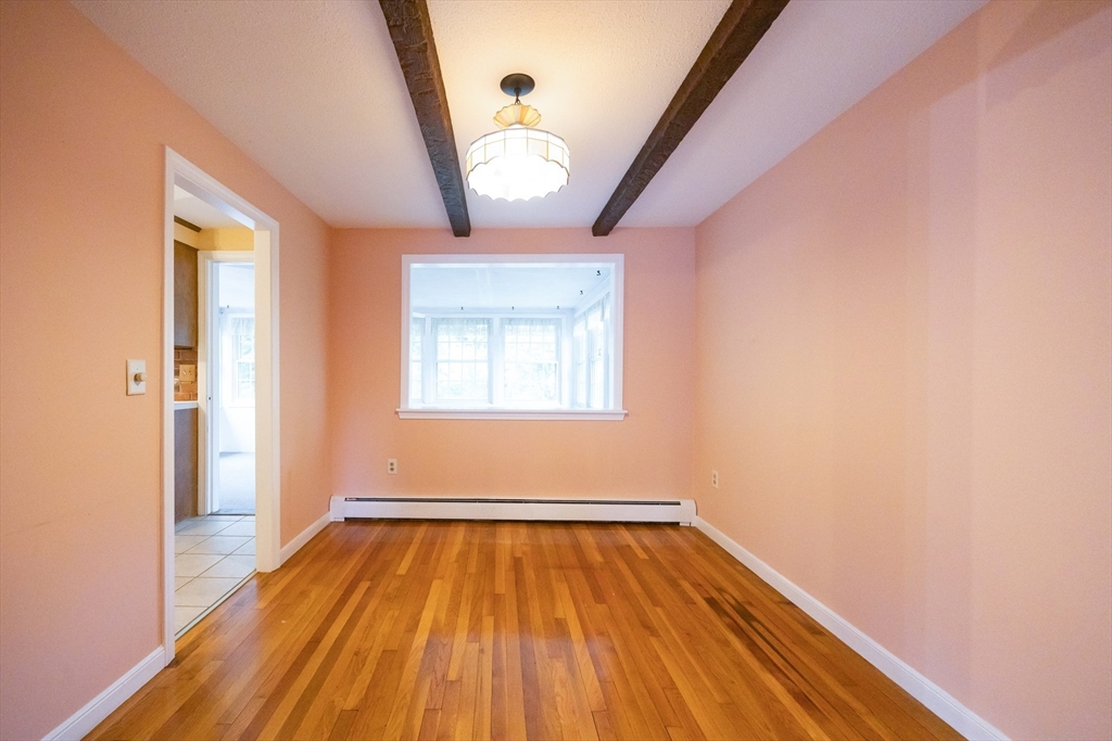 6 Clearview Drive Milford, MA 01757 - Photo 15 of 42 a view of empty room with wooden floor and fan