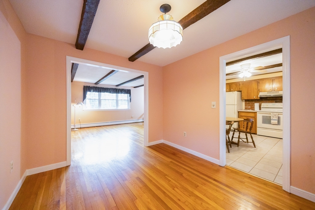 6 Clearview Drive Milford, MA 01757 - Photo 20 of 42 a view of a room with wooden floor and window