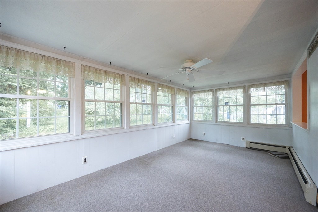 6 Clearview Drive Milford, MA 01757 - Photo 22 of 42 a view of an empty room with a window
