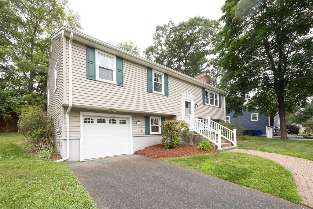 6 Clearview Drive Milford, MA 01757 - Photo 3 of 42 a view of a house with a backyard