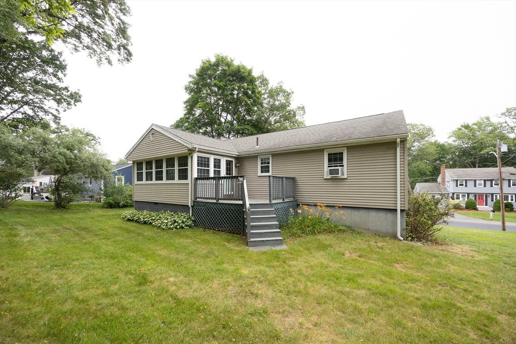 6 Clearview Drive Milford, MA 01757 - Photo 4 of 42 a front view of a house with a yard