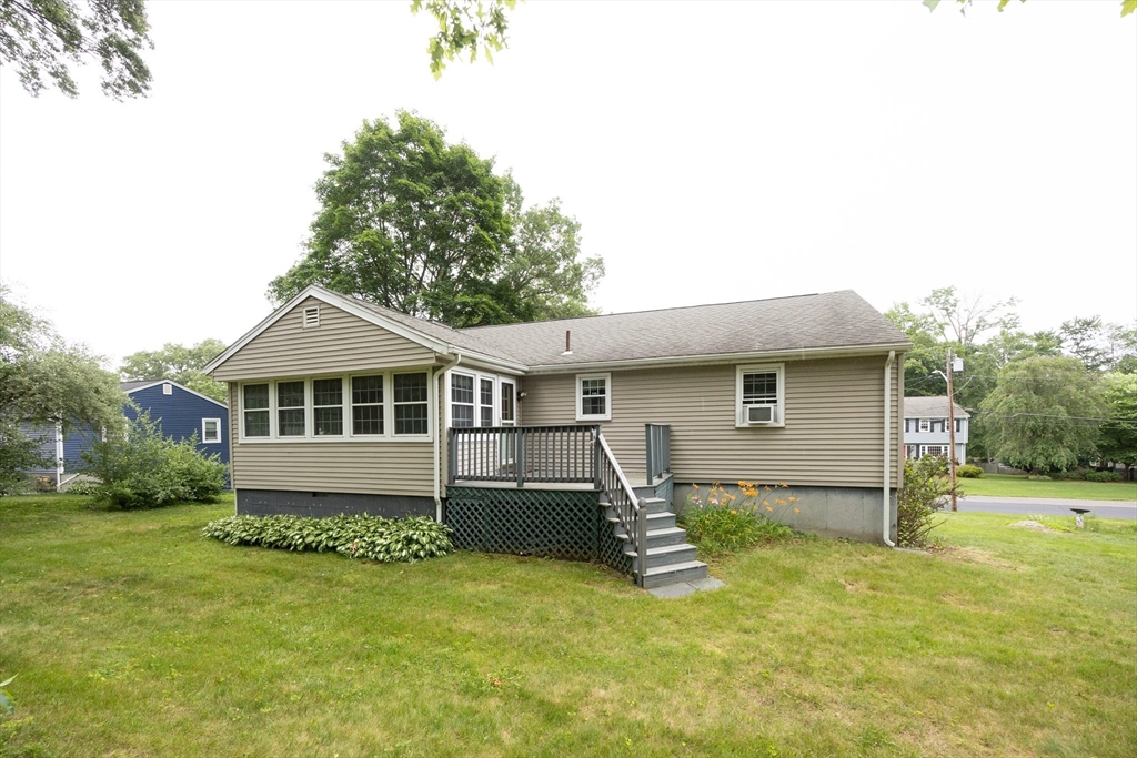 6 Clearview Drive Milford, MA 01757 - Photo 5 of 42 a front view of a house with a yard