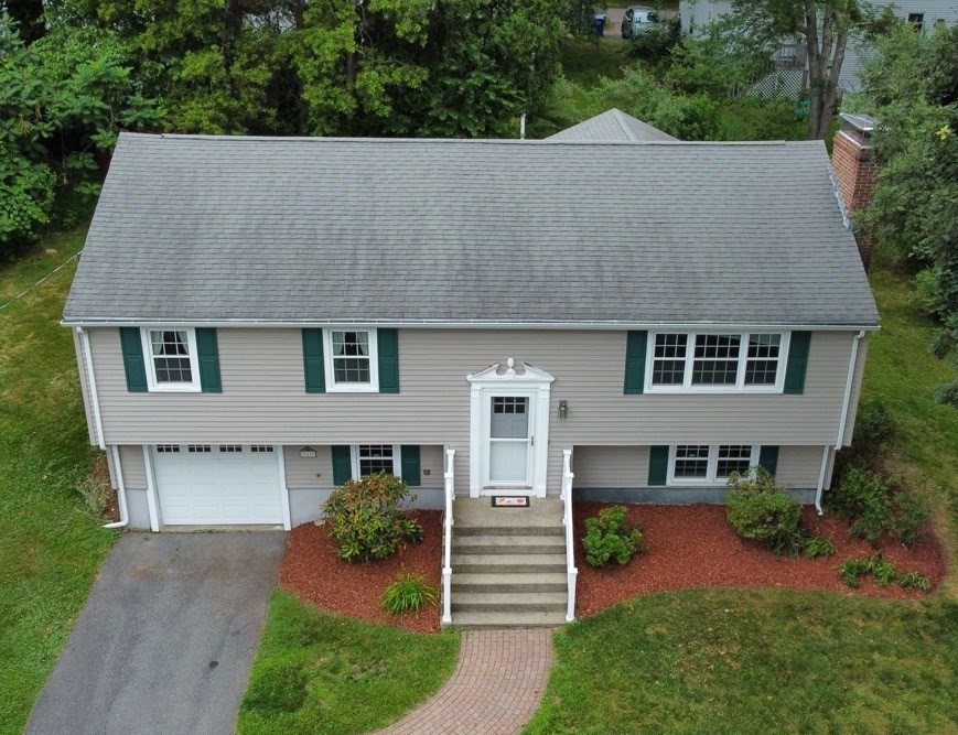 6 Clearview Drive Milford, MA 01757 - Photo 9 of 42 front view of a house with a yard