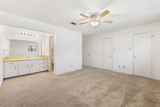 an empty room with windows